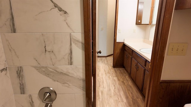 bathroom featuring vanity and hardwood / wood-style floors