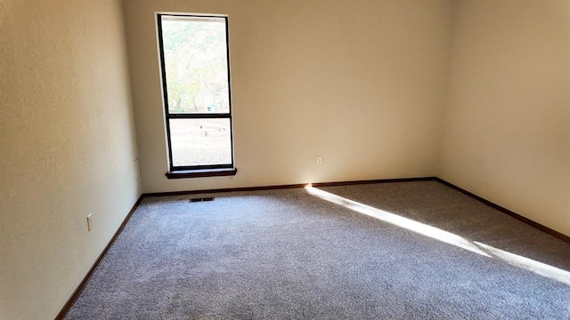 empty room with carpet floors