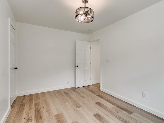 empty room with light wood-type flooring