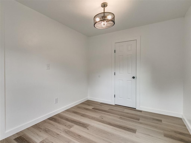 unfurnished room featuring light wood-type flooring