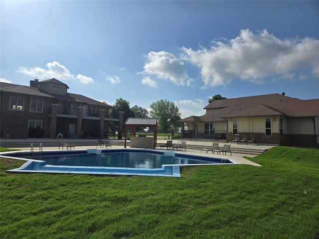 view of swimming pool featuring a gazebo, a yard, and a patio