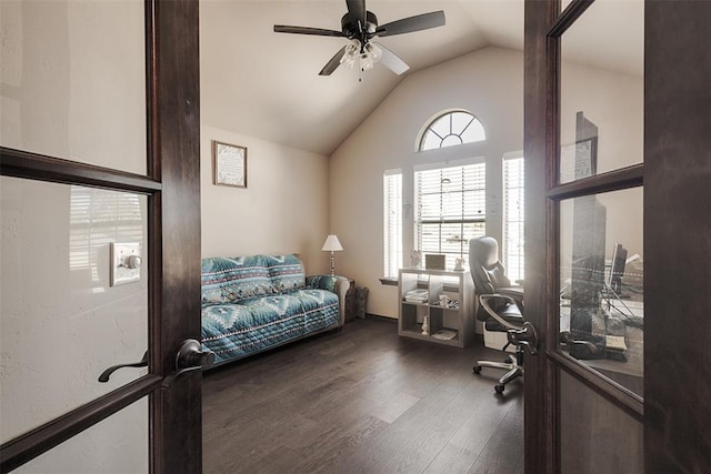 office space with lofted ceiling, ceiling fan, and dark wood-type flooring