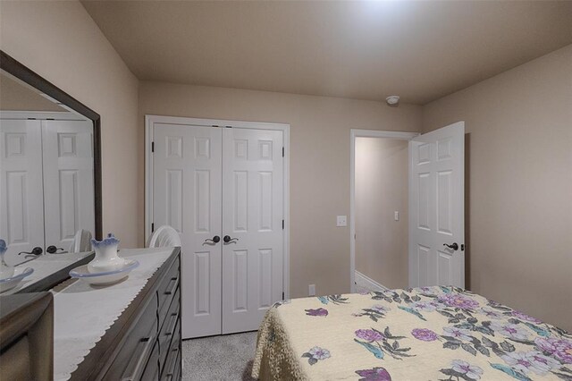 bedroom with light carpet