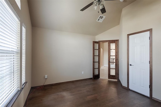 4536 Oasis Ct, Yukon, OK 73099 - empty room with vaulted ceiling, wood finished floors, ceiling fan, french doors, and baseboards
