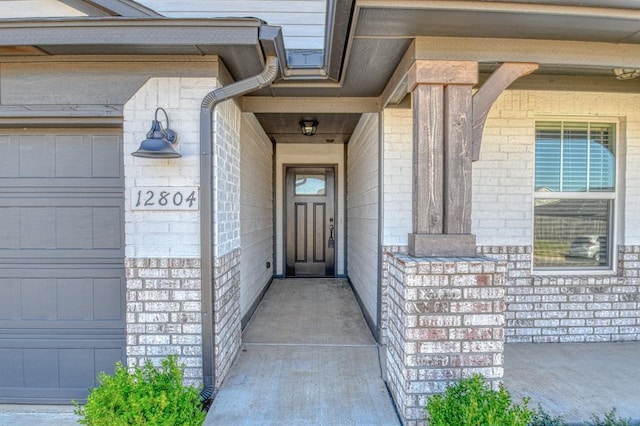 property entrance with a garage