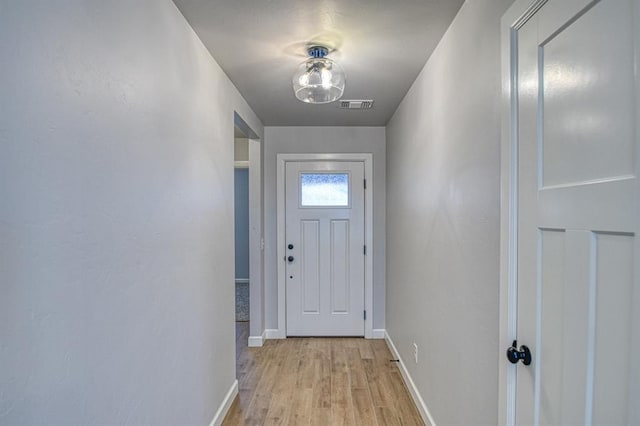 doorway featuring light wood-type flooring