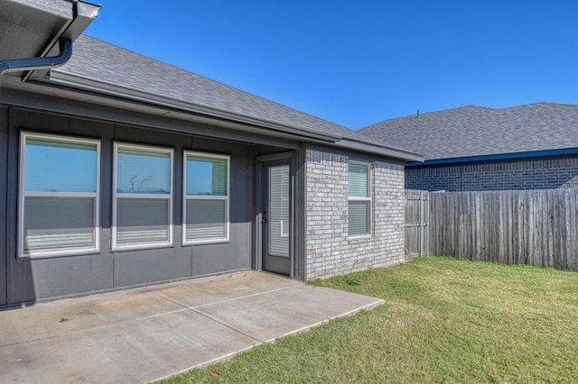 exterior space with a yard and a patio