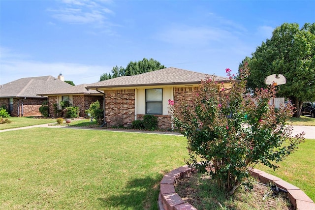 ranch-style home with a front yard