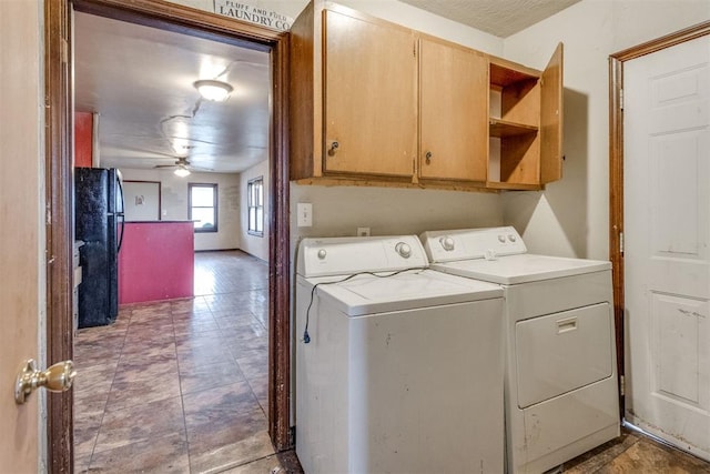 clothes washing area with cabinet space, independent washer and dryer, and ceiling fan
