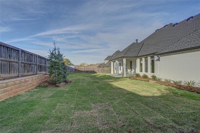 view of yard with a patio area