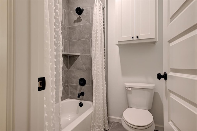 bathroom with toilet, tile patterned flooring, and shower / bath combo