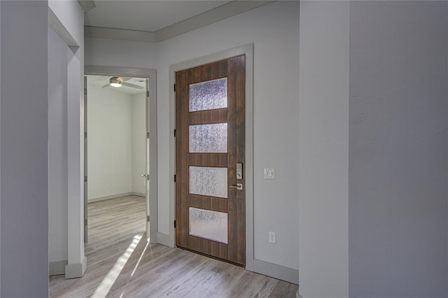 entryway featuring light hardwood / wood-style floors and ceiling fan