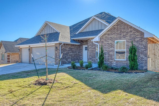 front facade with a garage and a front lawn