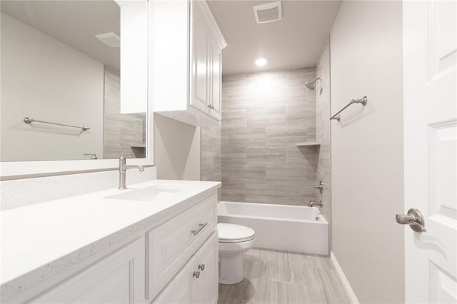 full bath with visible vents, toilet, bathtub / shower combination, recessed lighting, and vanity