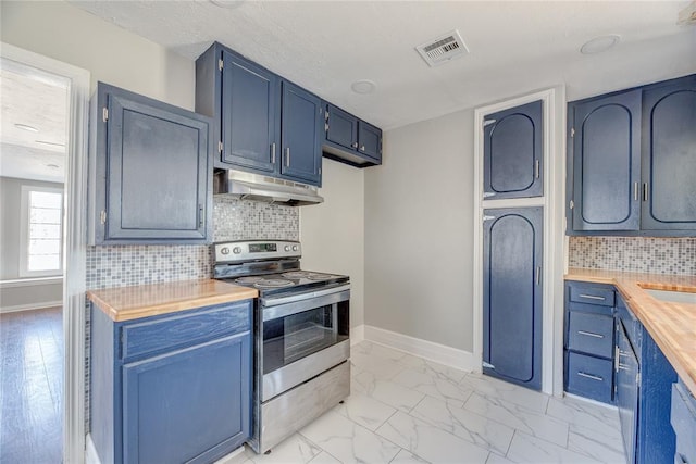 kitchen with butcher block countertops, decorative backsplash, electric stove, and blue cabinets