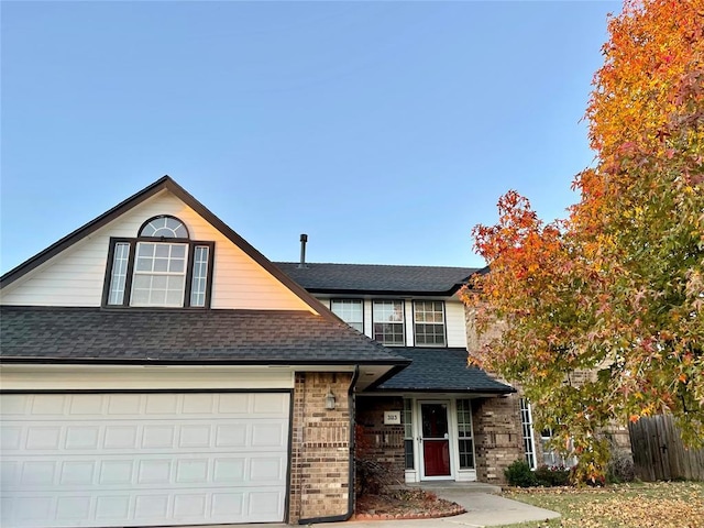 view of front of property with a garage