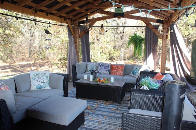 deck featuring a gazebo and an outdoor hangout area