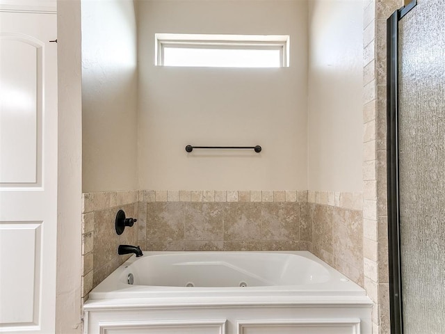 bathroom featuring a bath