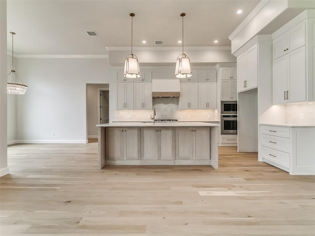 16413 Burgundy E Dr, Edmond, OK 73013 - kitchen with stainless steel appliances, ornamental molding, decorative backsplash, white cabinets, and light countertops