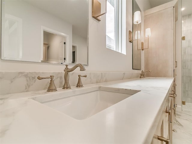 16413 Burgundy E Dr, Edmond, OK 73013 - bathroom with double vanity, a stall shower, and marble finish floors