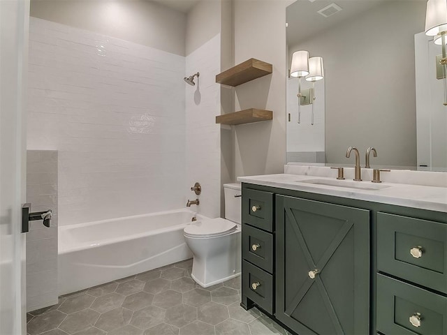 16413 Burgundy E Dr, Edmond, OK 73013 - bathroom featuring vanity, shower / bathtub combination, toilet, and tile patterned floors