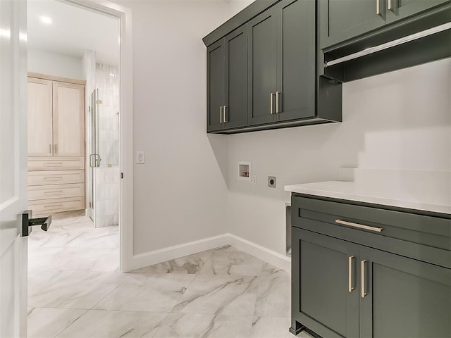 16413 Burgundy E Dr, Edmond, OK 73013 - washroom with light marble finish flooring, electric dryer hookup, cabinet space, hookup for a washing machine, and baseboards