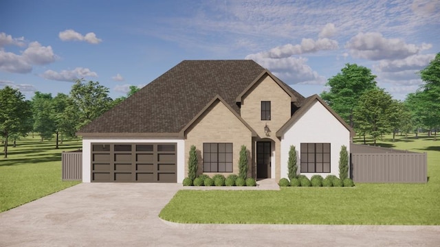 view of front of home with a front yard and a garage