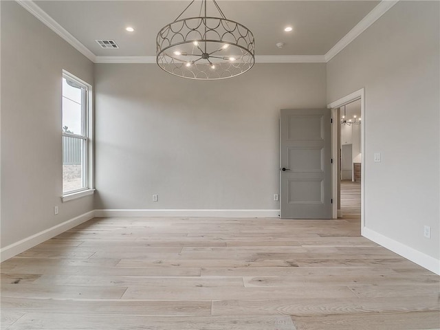 unfurnished room with crown molding, light hardwood / wood-style floors, and an inviting chandelier