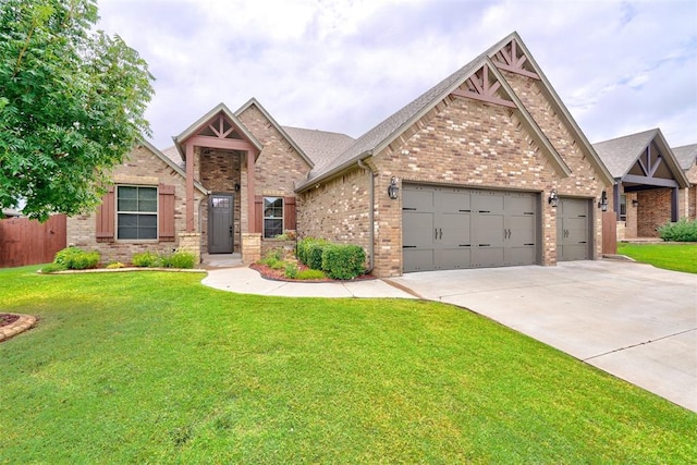 craftsman-style house with a front yard and a garage