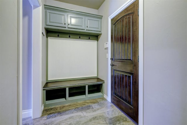 mudroom with light tile patterned floors