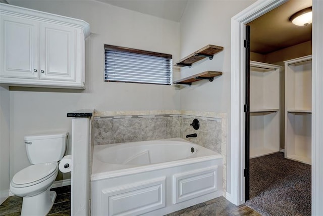 bathroom featuring a bathtub and toilet