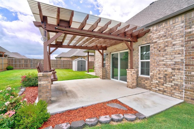 view of patio / terrace with a storage shed and a pergola