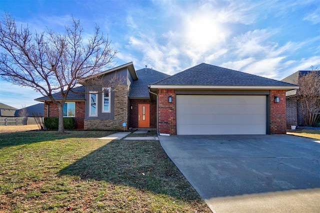 view of front facade featuring a front lawn and a garage