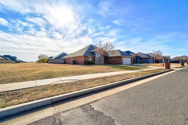 ranch-style house featuring a garage