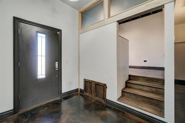 foyer featuring plenty of natural light