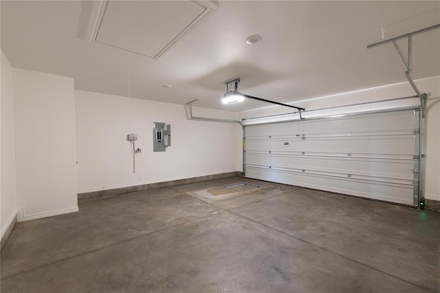garage featuring electric panel, baseboards, and a garage door opener