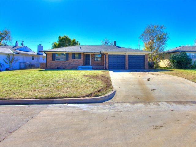 ranch-style house with a front yard and a garage