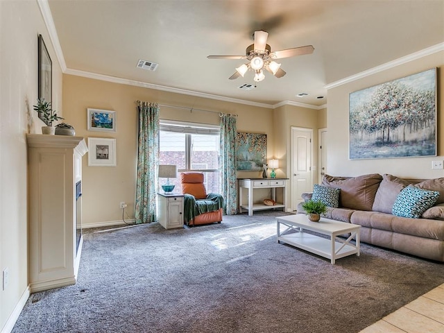 living room featuring carpet, ceiling fan, and crown molding