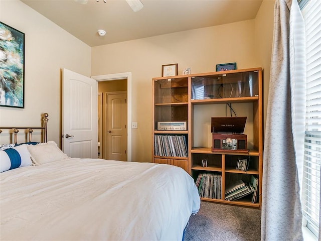 bedroom with multiple windows and ceiling fan