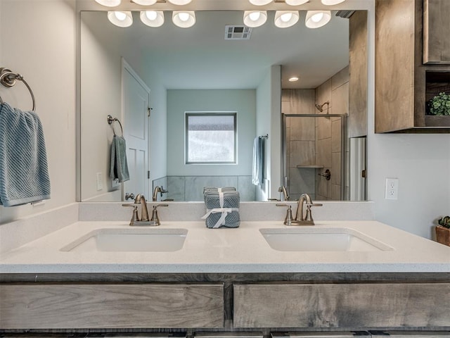 bathroom featuring vanity and walk in shower