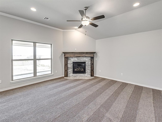 unfurnished living room with carpet flooring, crown molding, ceiling fan, and vaulted ceiling