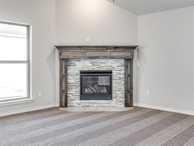 room details with a fireplace and carpet floors