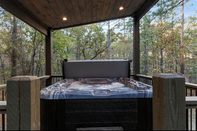 exterior space featuring a hot tub