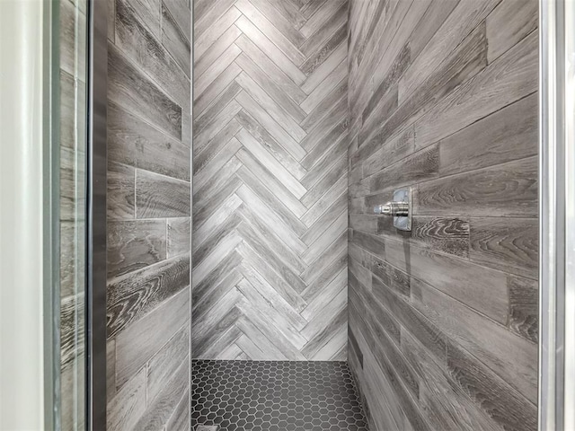 room details featuring a shower and parquet floors