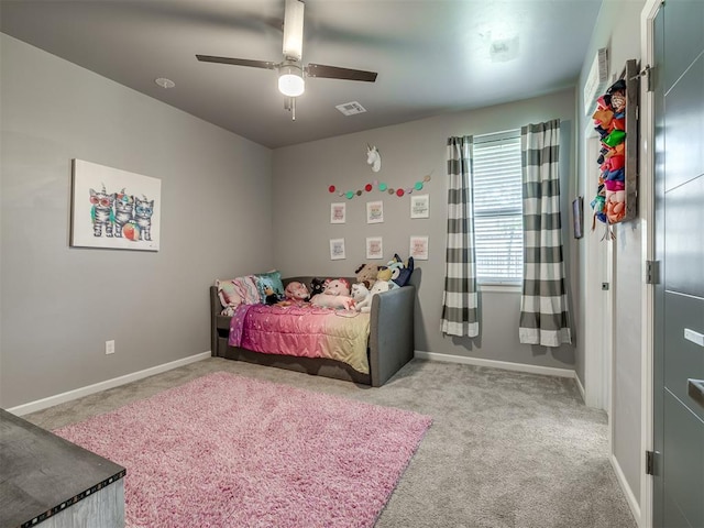 bedroom featuring ceiling fan and light colored carpet