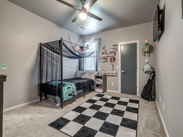 carpeted bedroom featuring ceiling fan