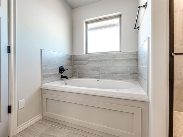 bathroom featuring a bathing tub and tile patterned floors