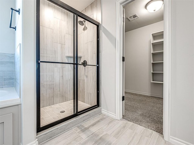 bathroom with walk in shower