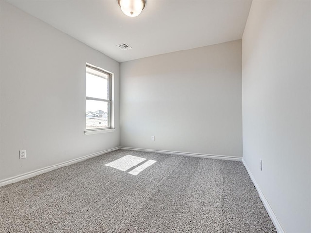 empty room featuring carpet