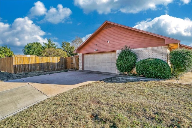 view of property exterior featuring a garage